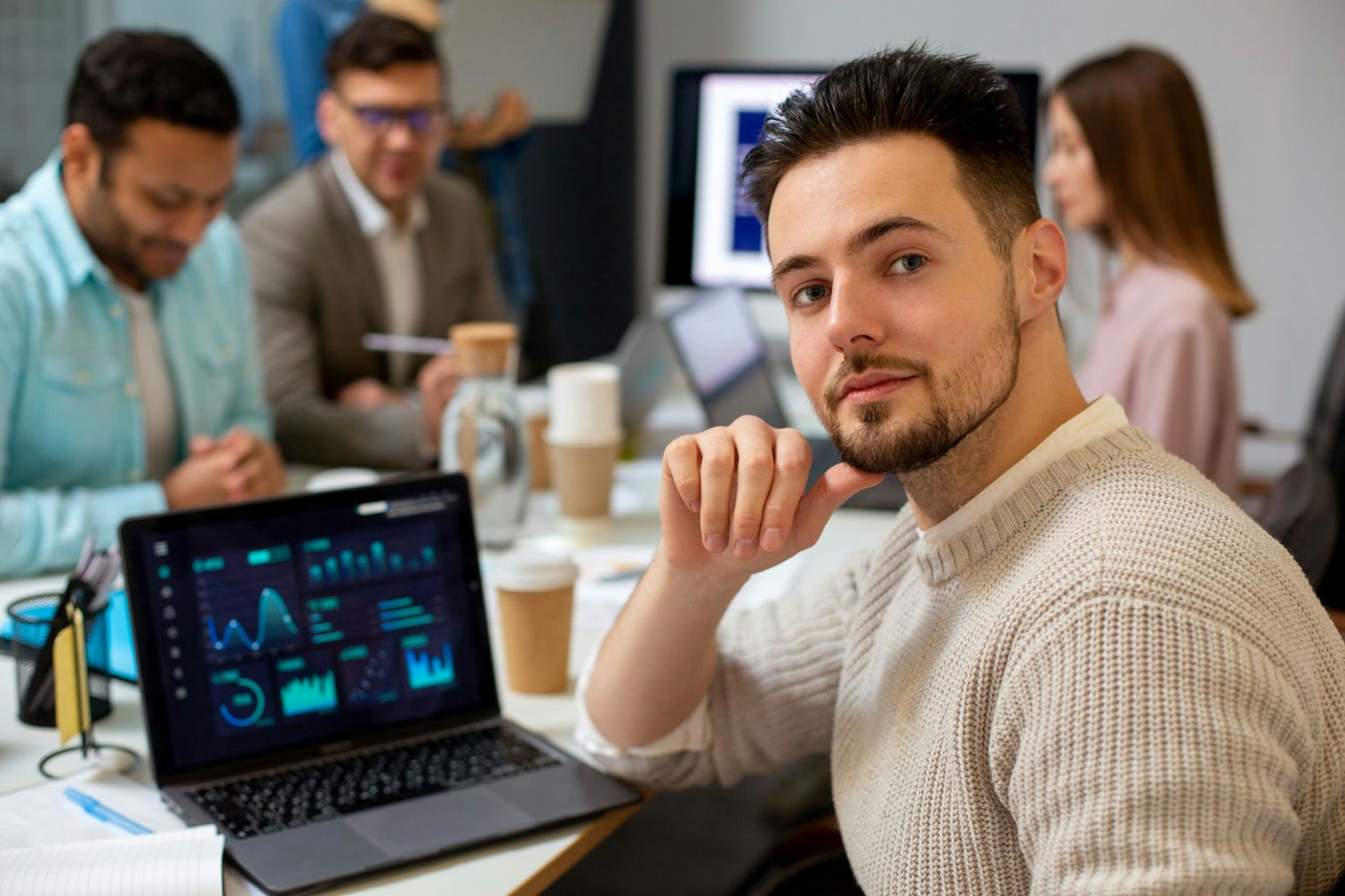 Two people looking at digital device