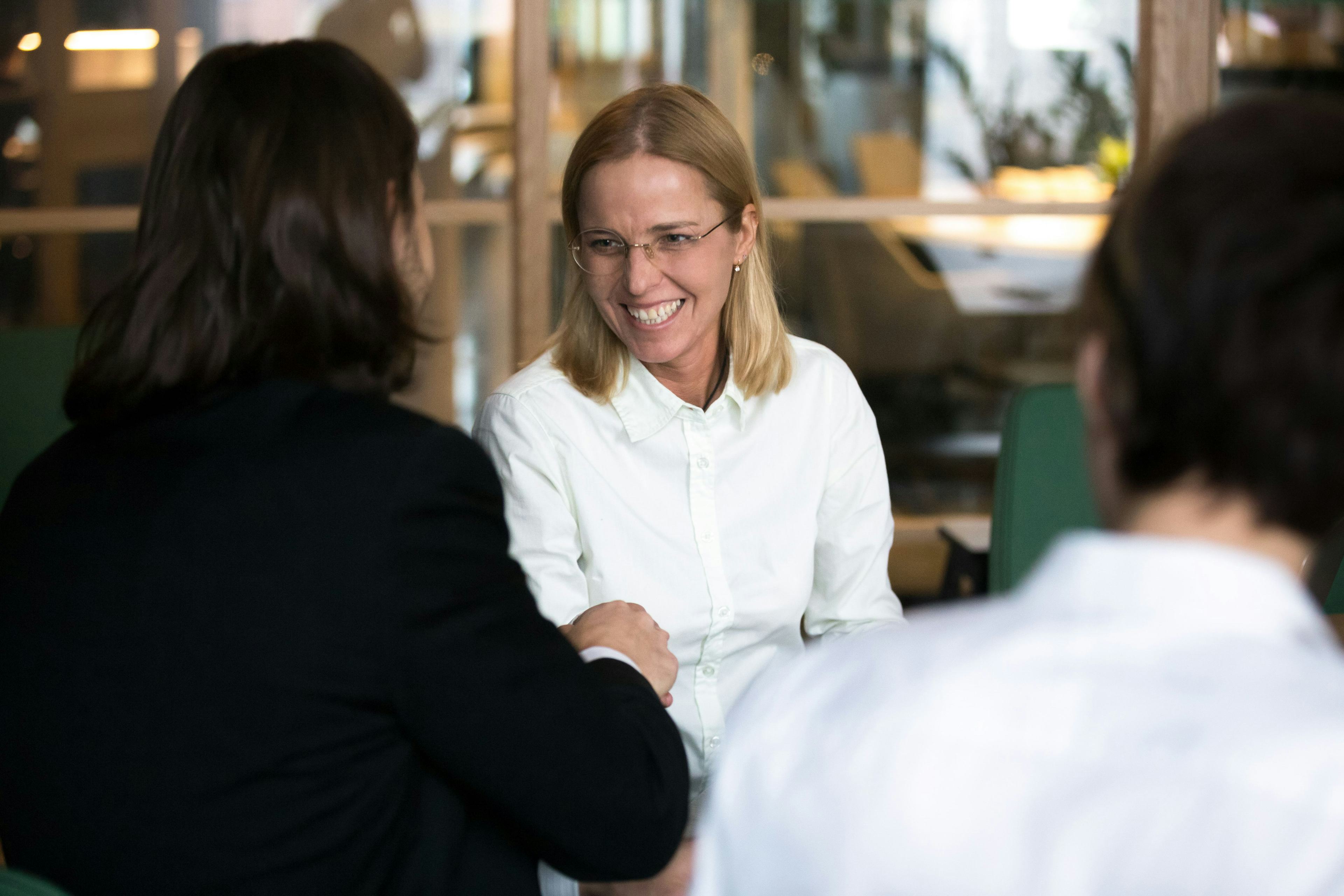 smiling woman during meeting