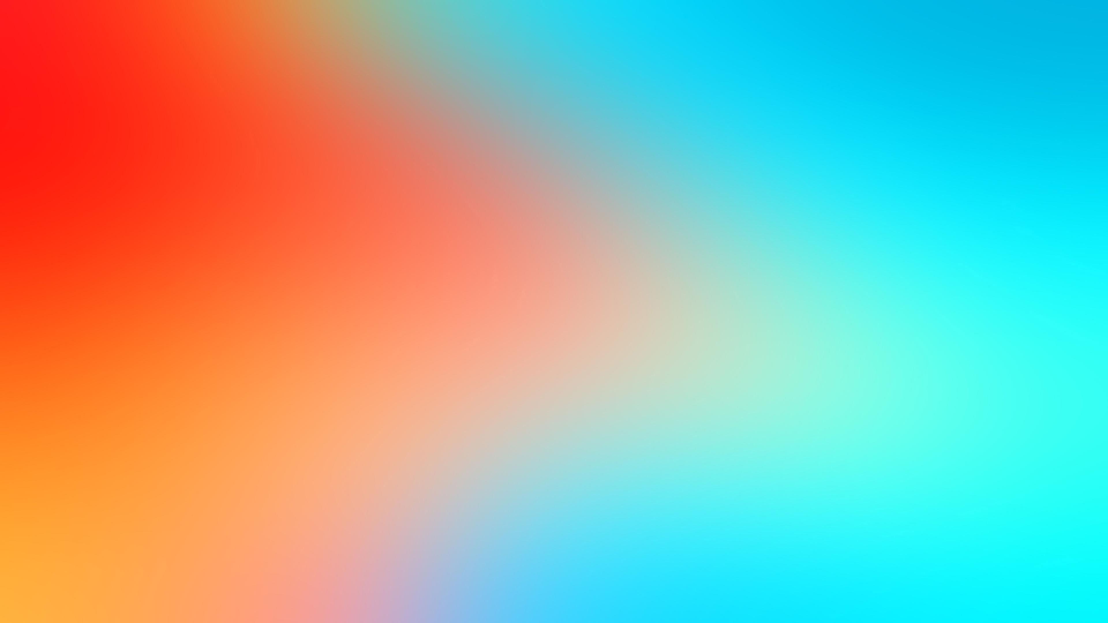 orange, red, and blue blur gradient background