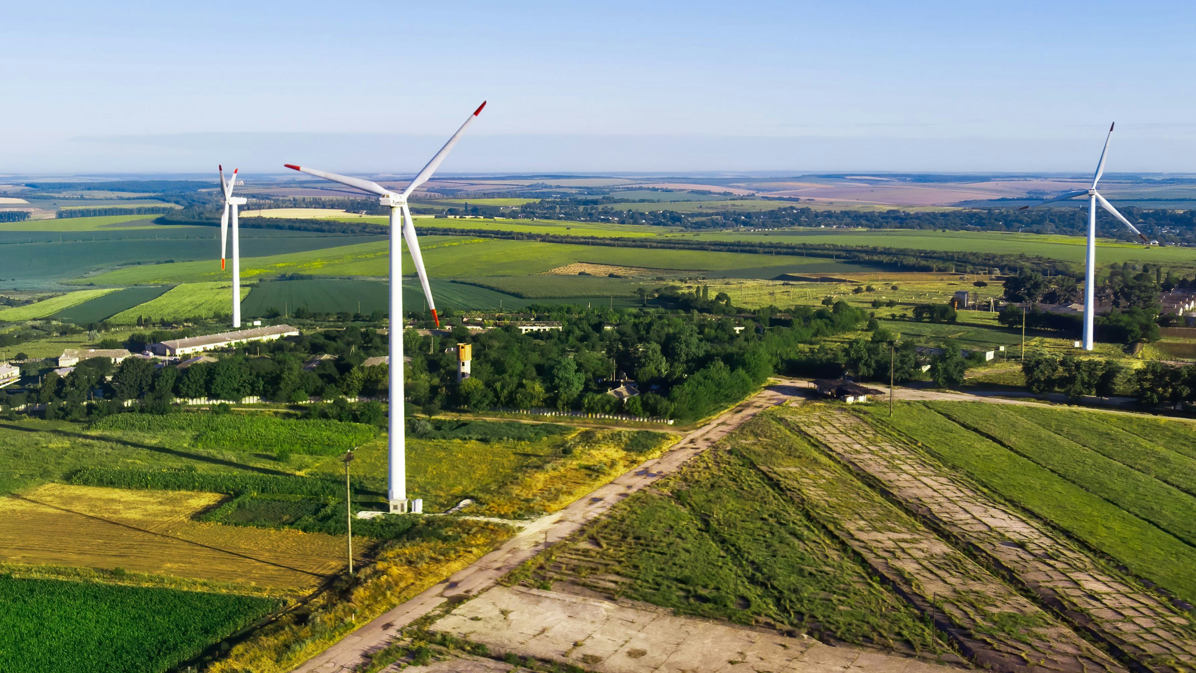 wind turbines in a rural farmland