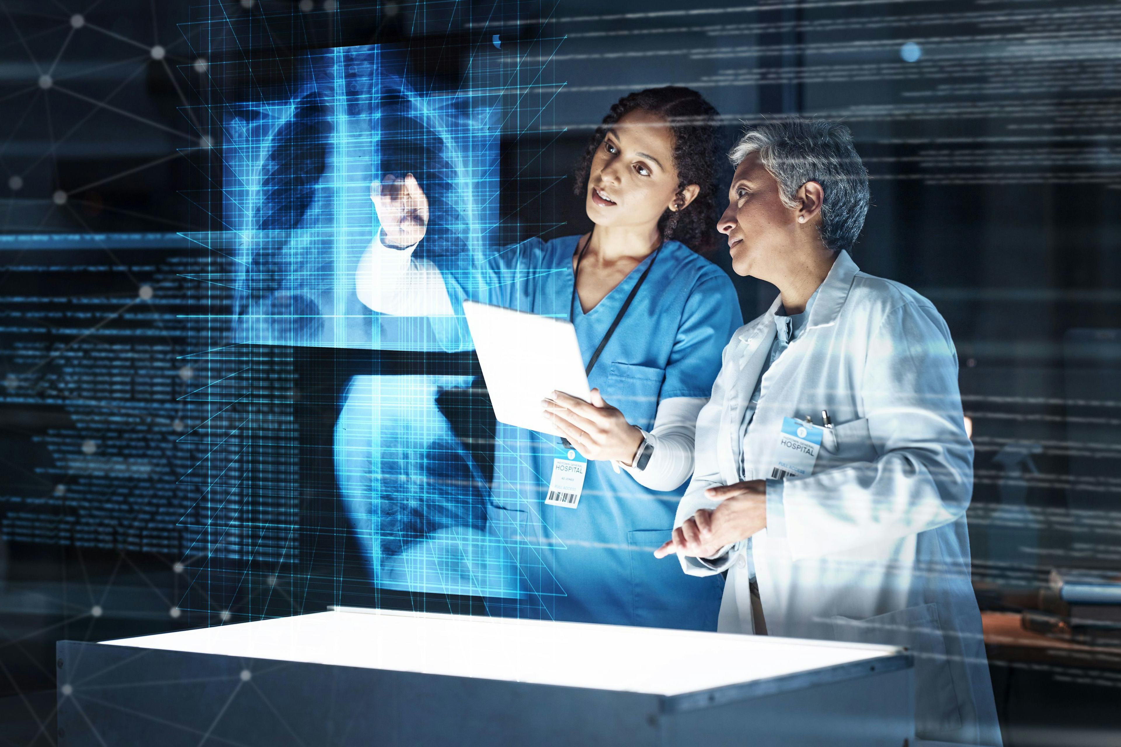 Doctors looking at a hologram of a patient's lungs