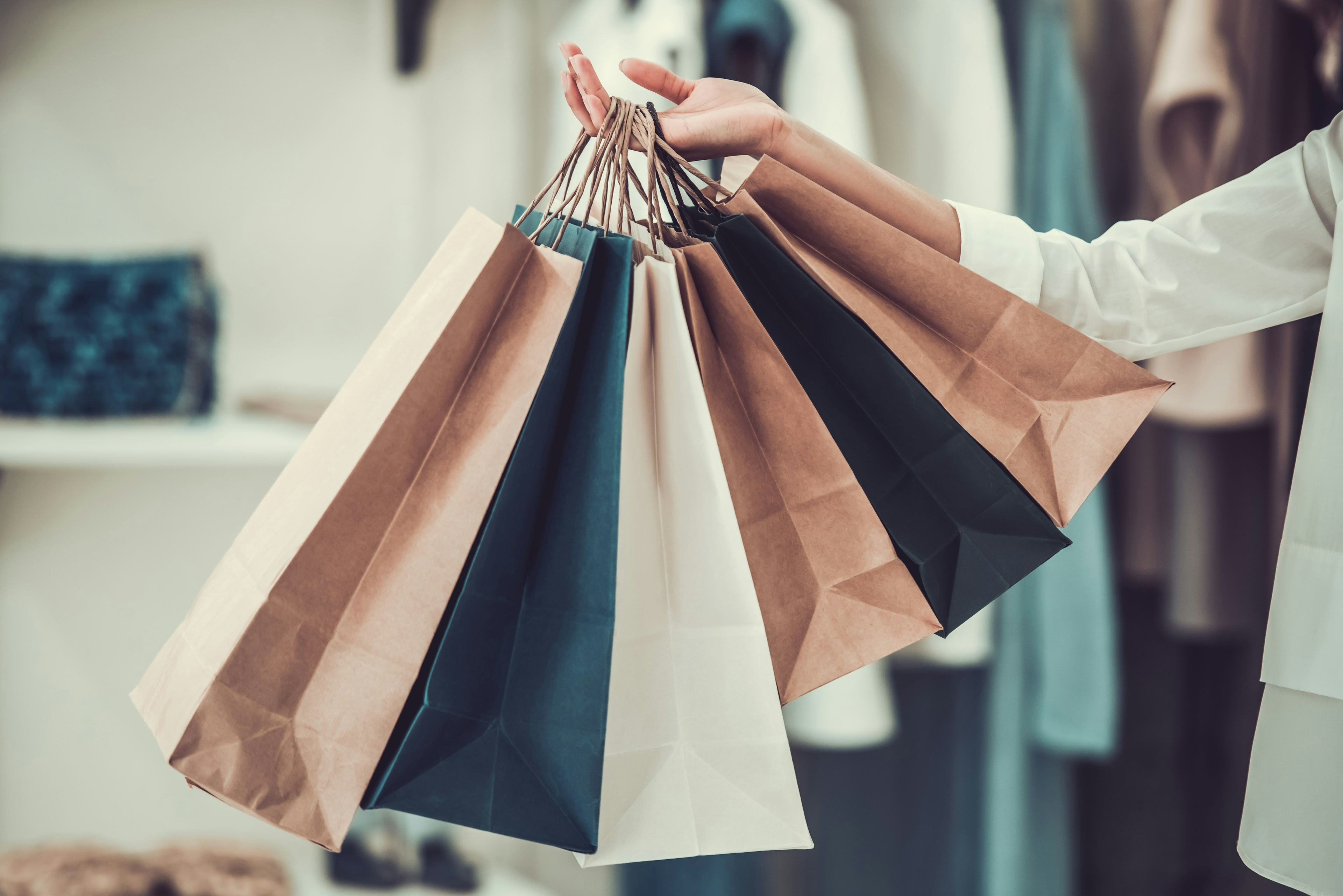 woman holding shopping bags