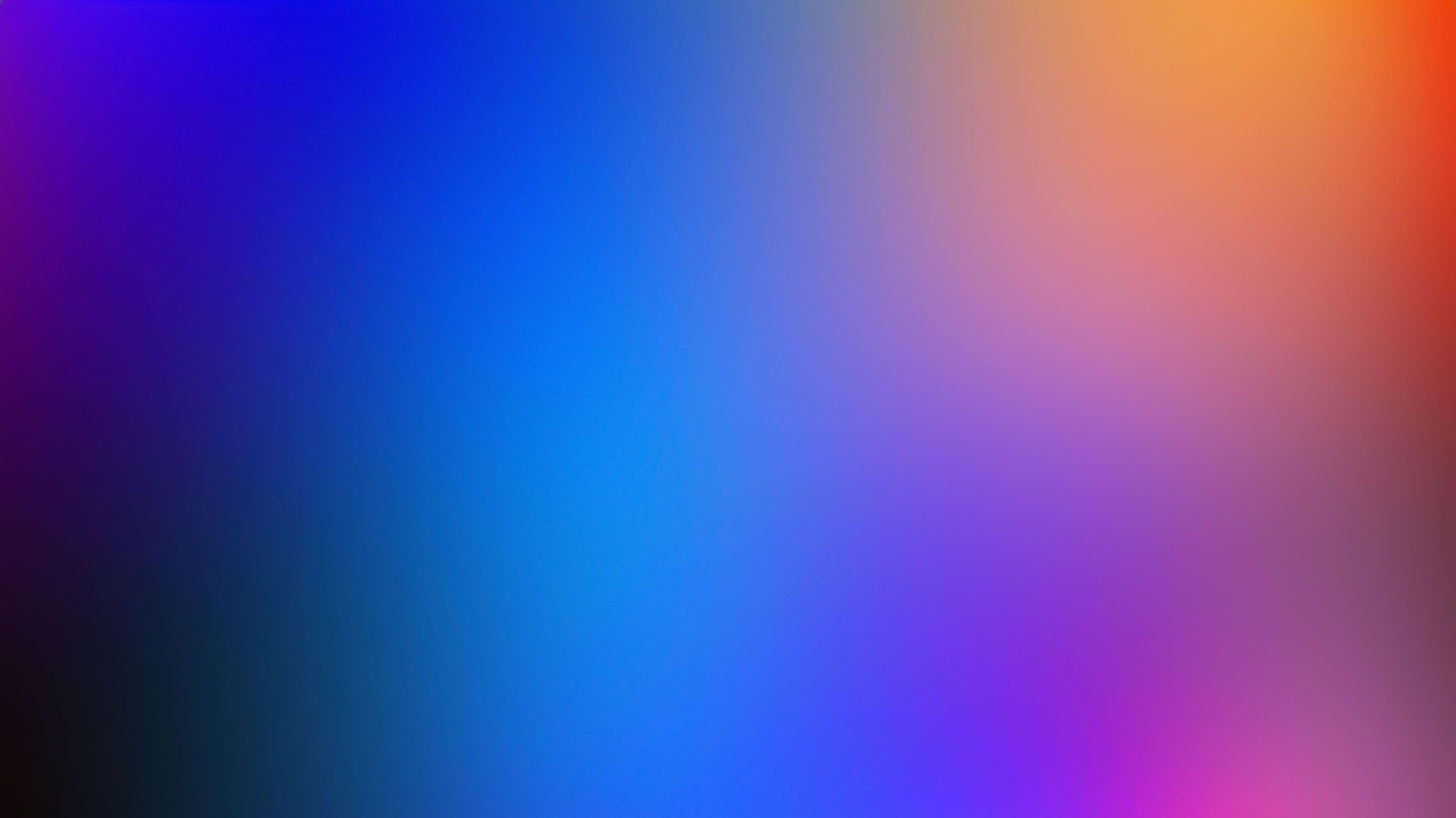 blue, pink, and orange blurred gradient background