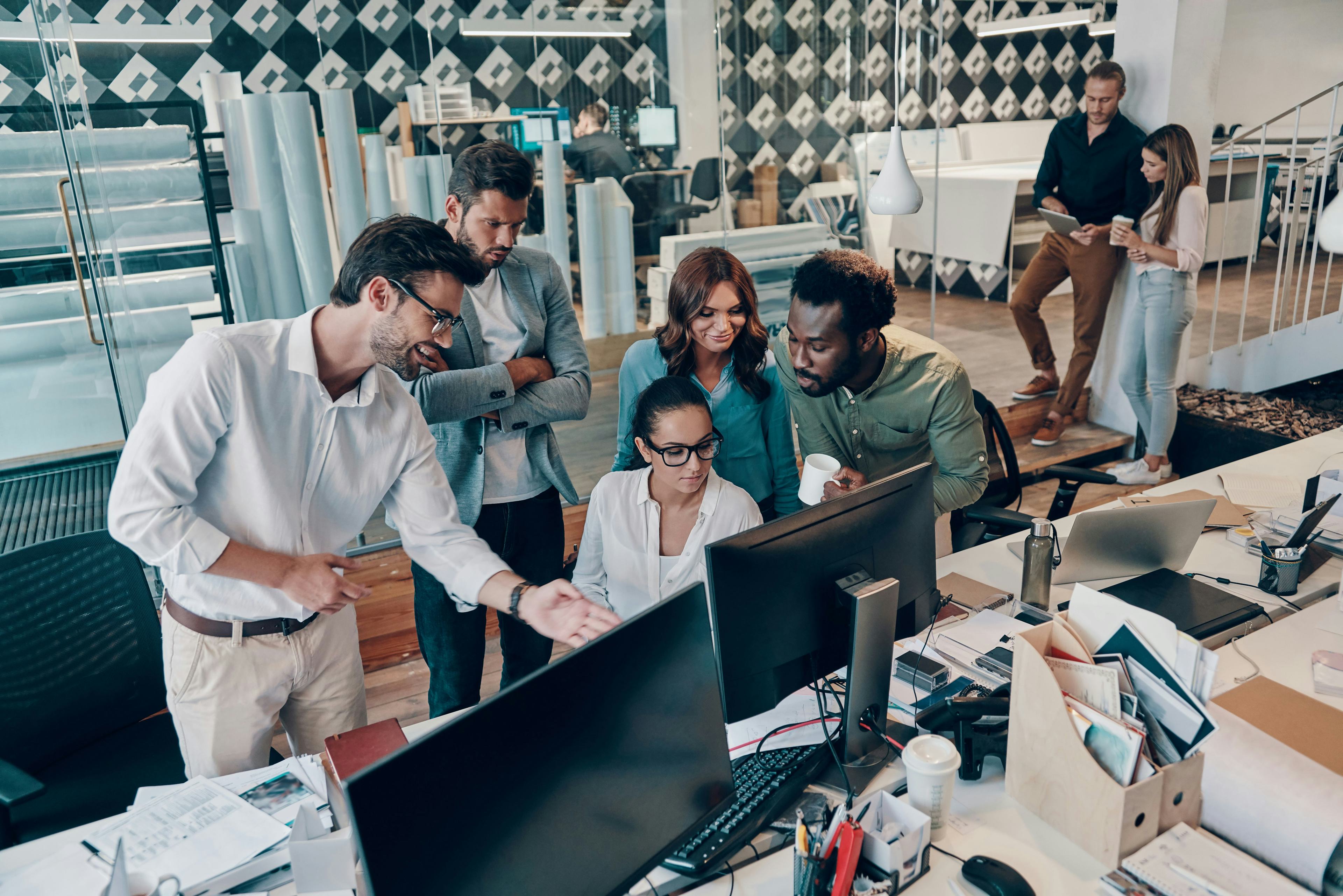 group of people working in an office