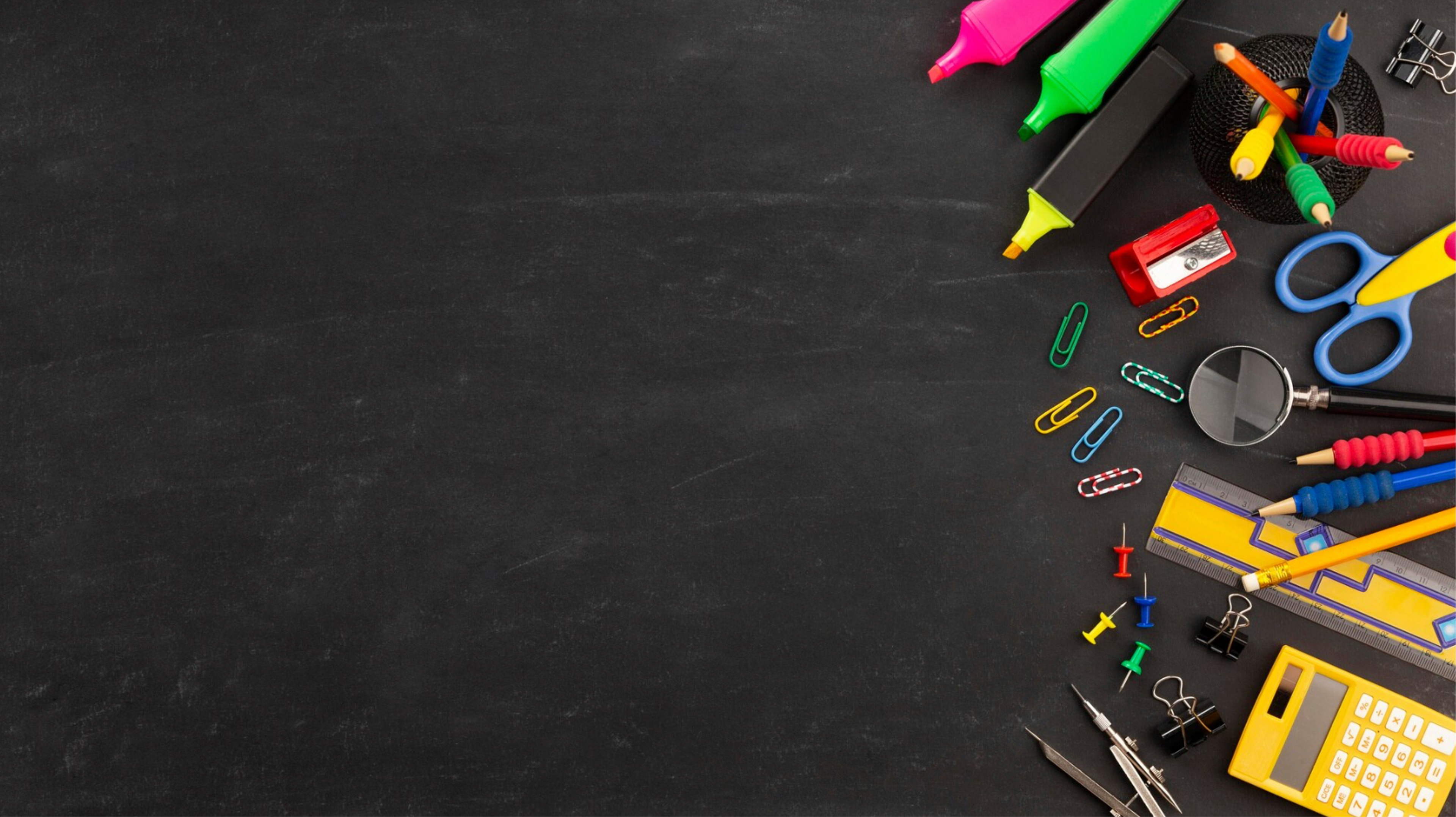 blackboard with school supplies gathered on right side