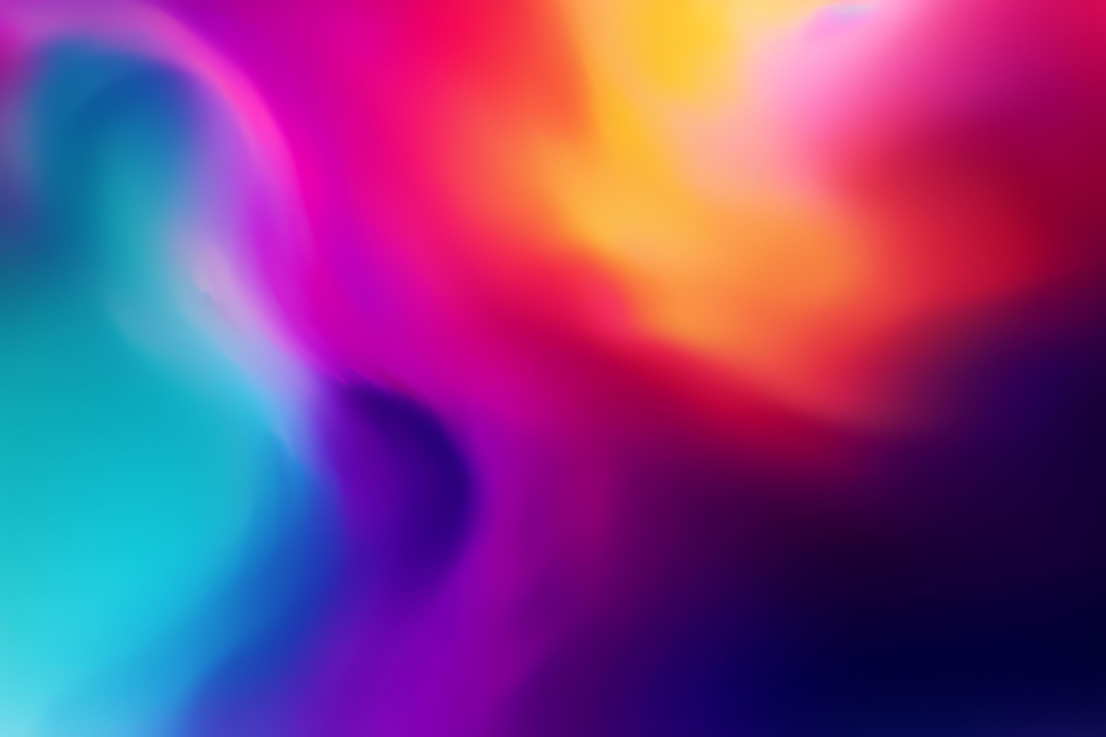 orange, purple, blue, and pink sunset gradient background