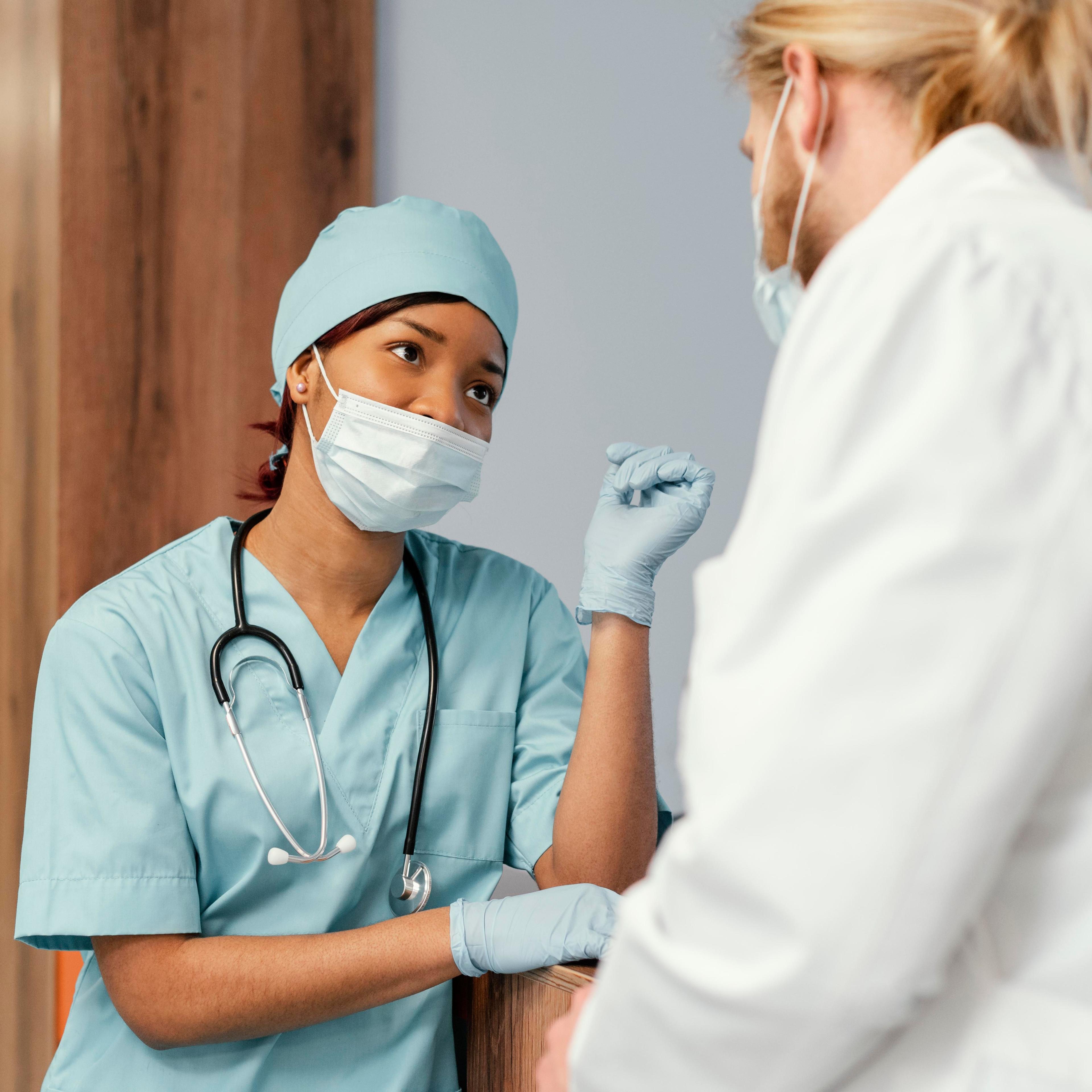 close up of health workers working together 