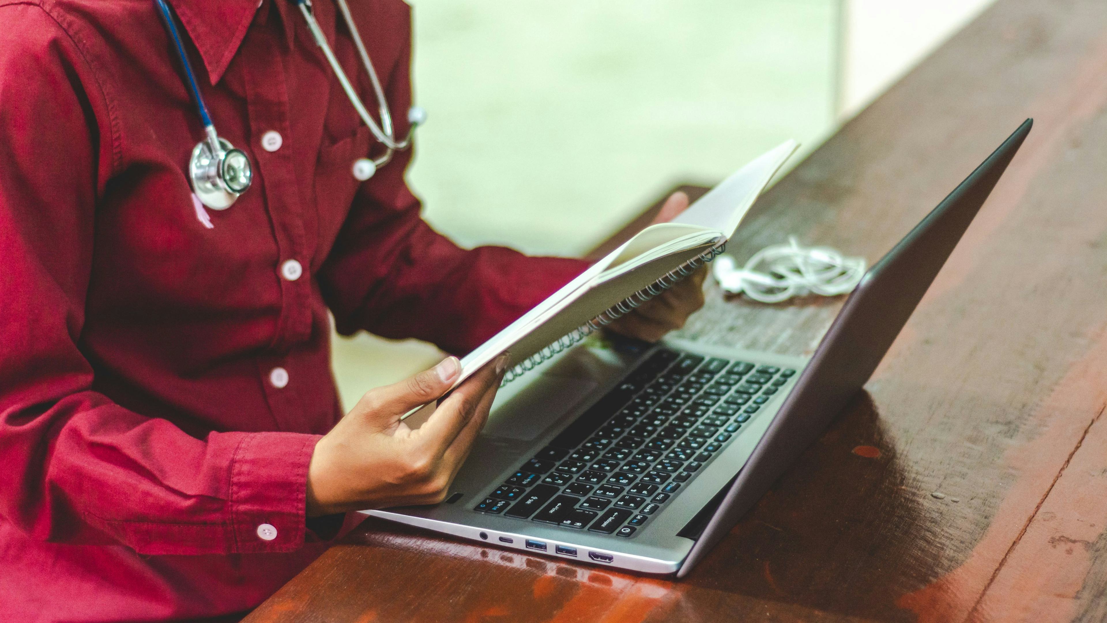 doctor working on laptop