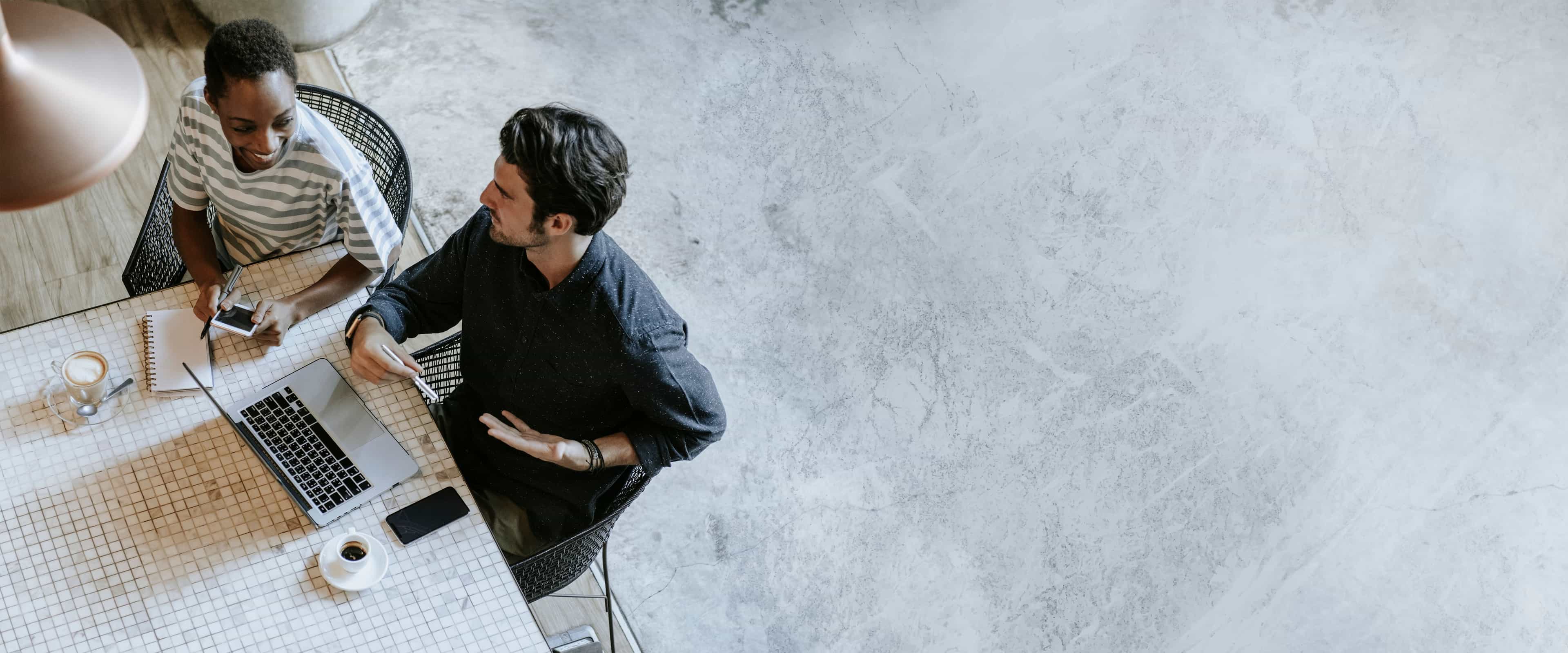 Coworkers discussing talks together